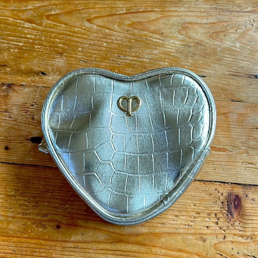 New Cle De Peau gold heart travel makeup bag